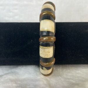 Bone and wood bangle bracelet.